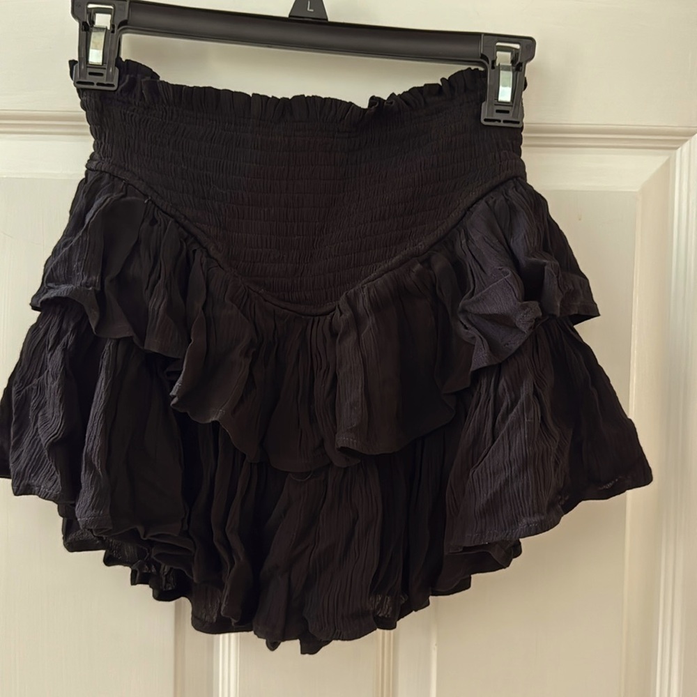 Cute black 2 ruffle skort. Includes shorts under skirt.measurements below. NWOT